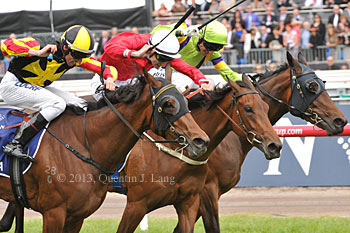 Kirramosa (outside) wins from Zanbagh (middle) and Solicit